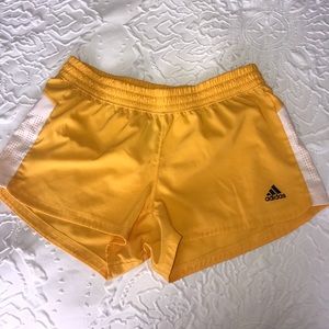 Adidas shorts/ Yellow and white